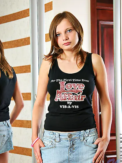 Teenie Lacey Nubiles pulls off her blue skirt and pink panties i