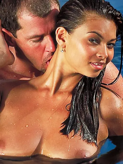 Busty brunette babe Tera Patrick strips in the pool and gets ban