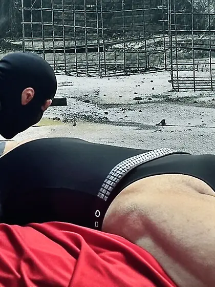 Black Superhero captured in netting.  KO and fondle