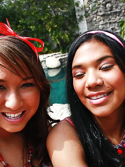 Black girl in pink headband and lesbian friend have fun by Cadil