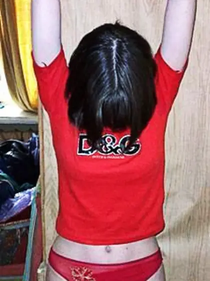 Arms Tied Above Her Head