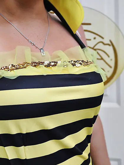 Kinky lassie in bee costume undresses to bag for candies on Hall