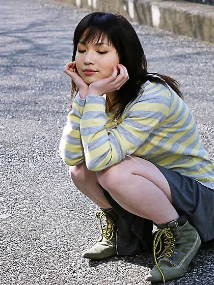 Asian cutie Ami Idols is fooling around flashing her small titti