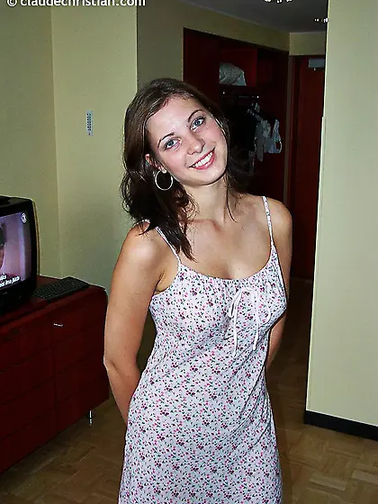 Paula undresses and show her cute body