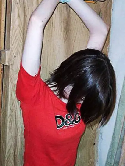 Arms Tied Above Her Head