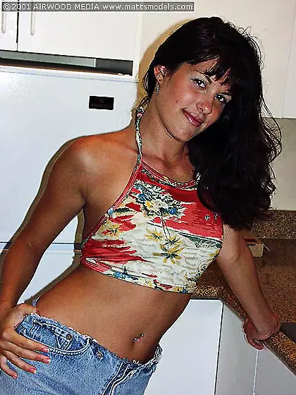 Leggy brunette chick Nikki Loren shows her hairy pussy all over