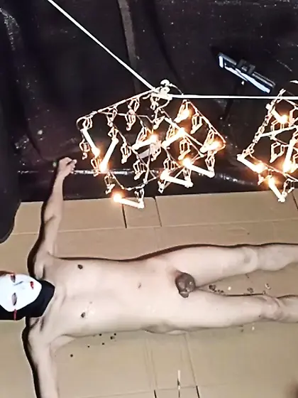 Wax is dripping from the laundry hanger.