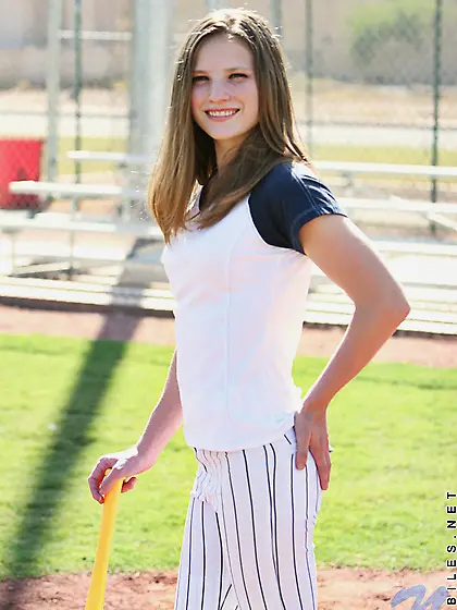 Adorable teen cutie with a slender body showing off her titties