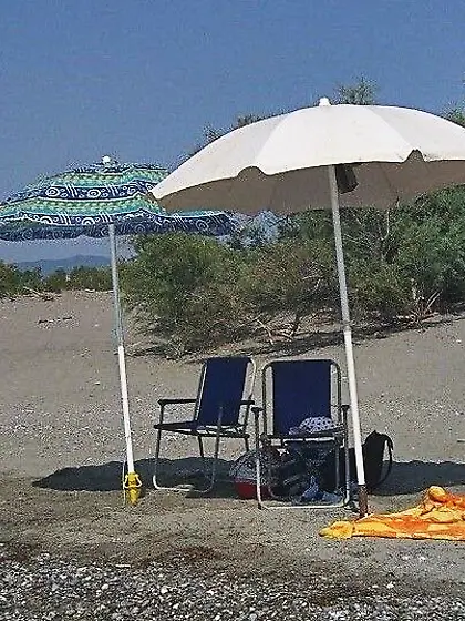 old wife with husband and snack mates at sea