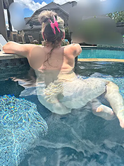 Naked wife in hot tub