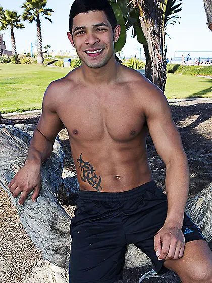 Swarthy latino lad tattoo
