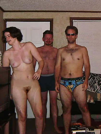 American couple posing to ranch