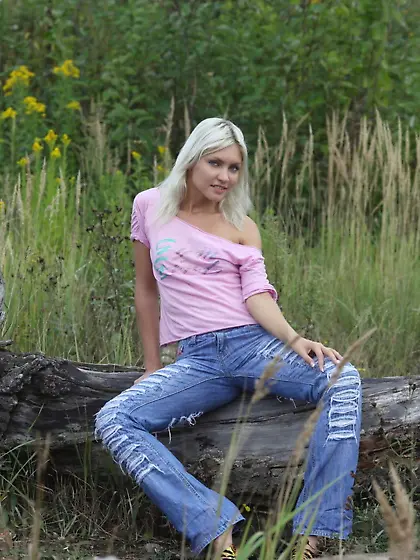 Cute blonde teeny posing