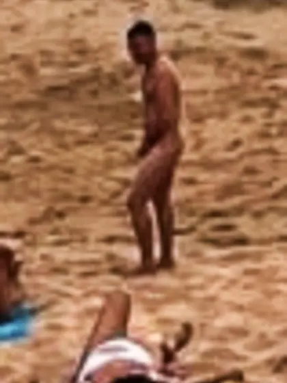 Man skinny dipping at the beach/pool