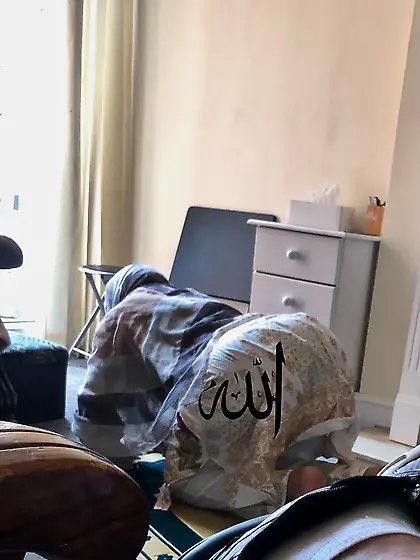 Mother in sajda arching her back for me