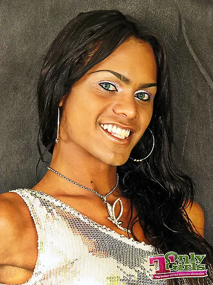 Dazzling tgirl in a short white dress