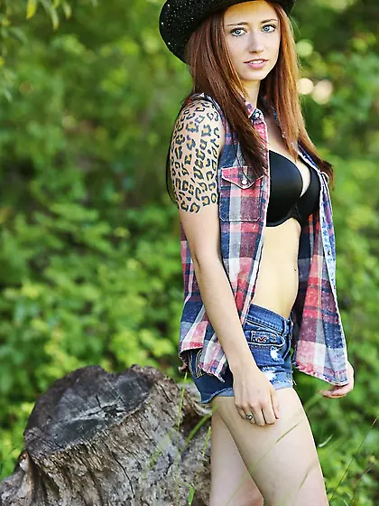 Wild and playful brunette Lily Xo enjoys in stripping and teasin