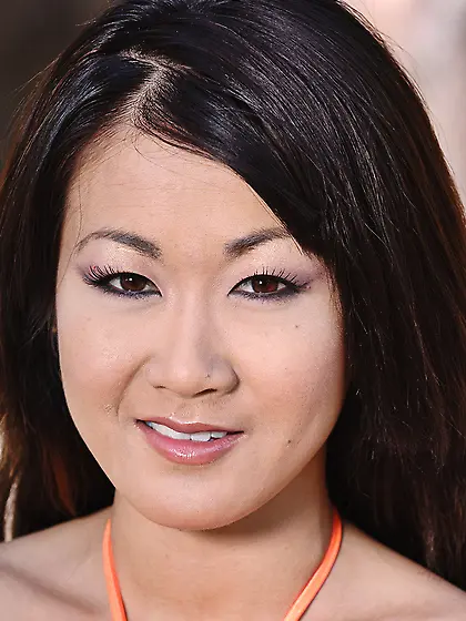 Lovely asian chick Taya Talise with shaved pussy strips out of h