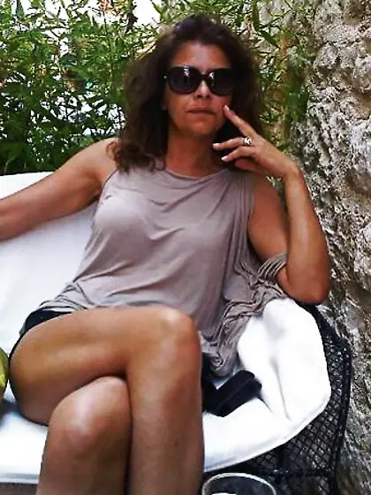 A boy is wanking on the sofa