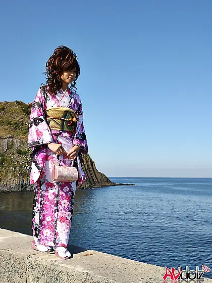 Asian slut knows her business and walks down the ocean shore att