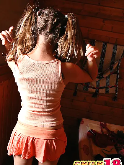 Hot pigtailed blonde Emily 18 takes off her clothes and shows us