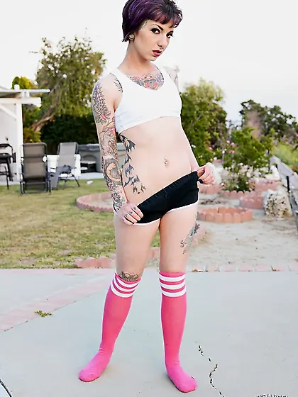 Purple haired angel poses