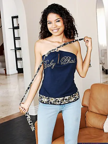 Smiling curly haired latina Carmella Woods with sexy slim body p