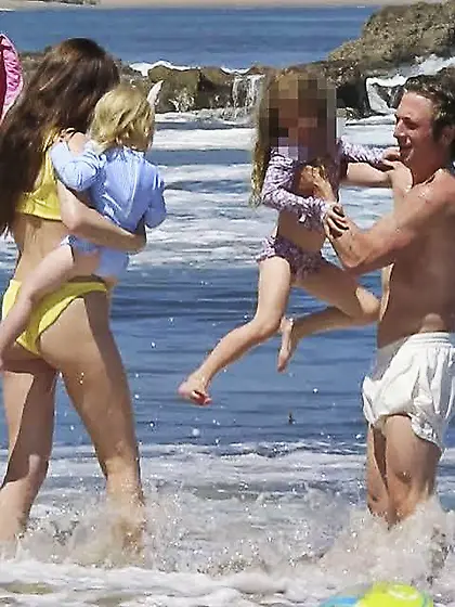 Dakota Johnson in a yellow bikini