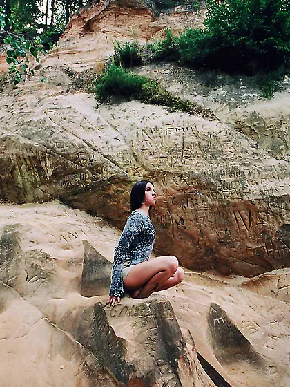 Russian teen outdoor naked posing on the cliff