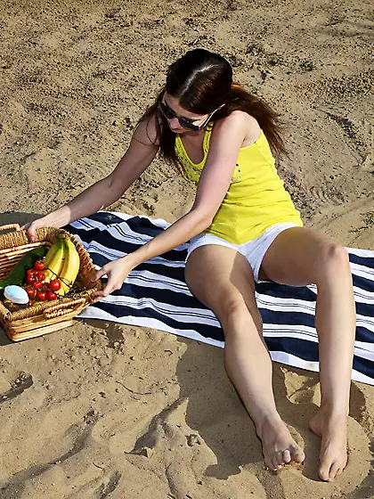 Shaved pussy of lewd Judy Smile is pleasingly eating the banana