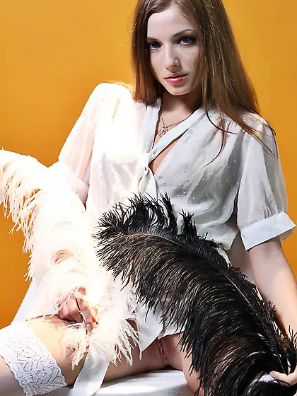 Nasty chick Alyssa A opens up her white stockings legs uncoverin