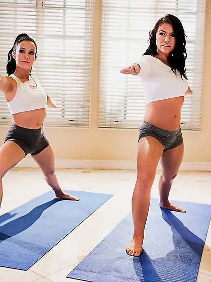 Brunette lesbian yoga class
