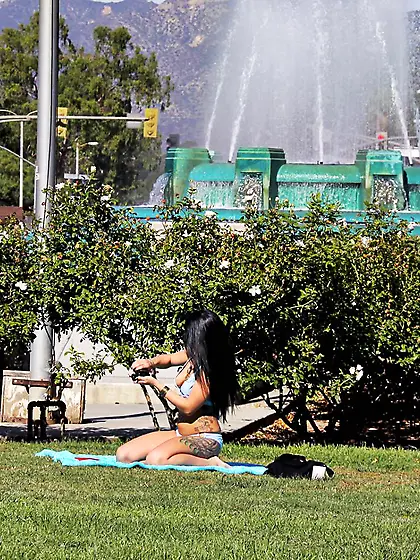 Naked raven haired chick Jackie Daniels reading a book in the ci