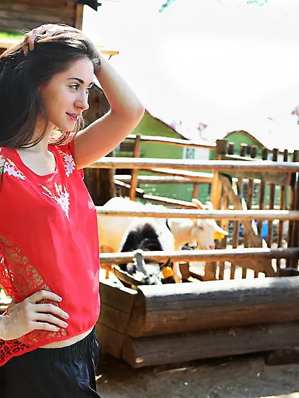 Sweet naked babe Aruna Aghora sets her ass on the ground and pla