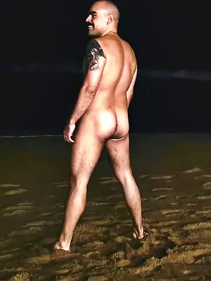 Man skinny dipping at the beach/pool