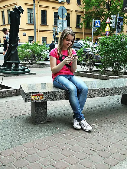 Young woman exchanges pinky flower for a rose from handsome Don