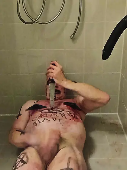 Satan Slave Cuts Open His Own Nipples