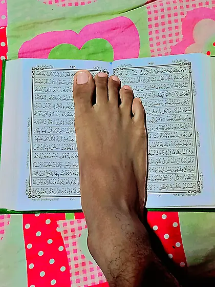 Feet on Kaba Feet on Quran
