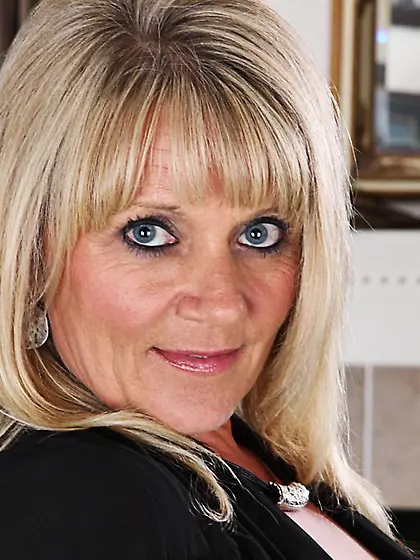 Aubrey Adams is a naughty milf and she is taking it all off for