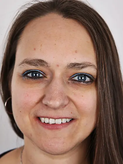 Woman turns photoshoot into dirty striptease exposing different-