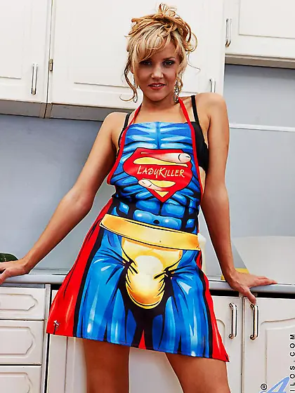 Frisky blonde milf Zlata Anilos is in the kitchen packing pussy
