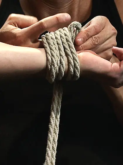 Young man tied stimulated