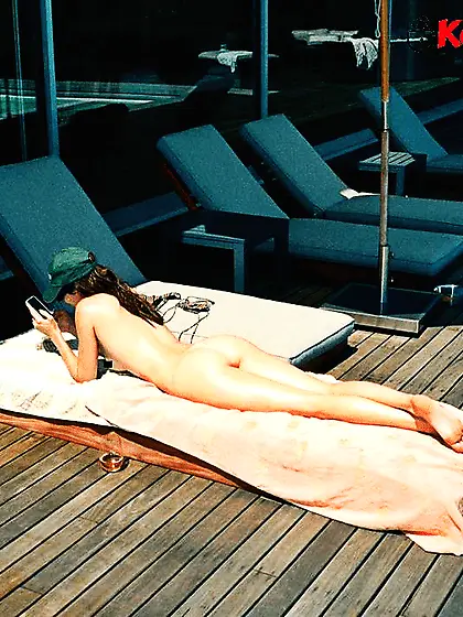 Kendall Jenner showing her amazing naked ass while sunbathin
