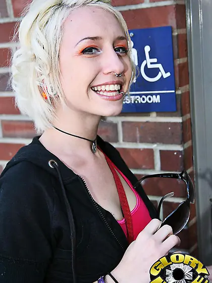 Blonde beauty Proxy Paige is holding black stuff in hands ready