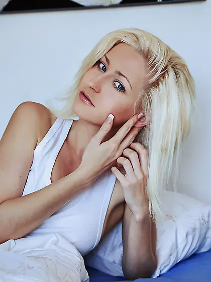 Blonde girl wakes naked