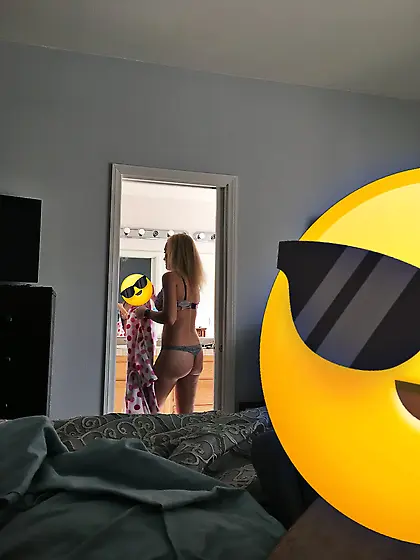 Spy pics--older blonde in bra and thong panties