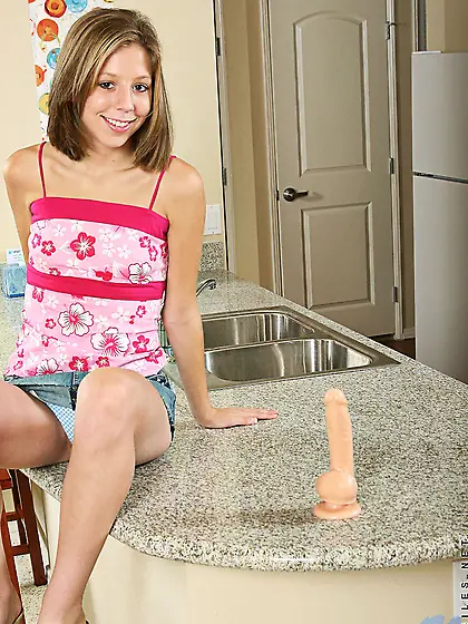 Chastity Lynn spreads her sexy legs for the camera and toys her