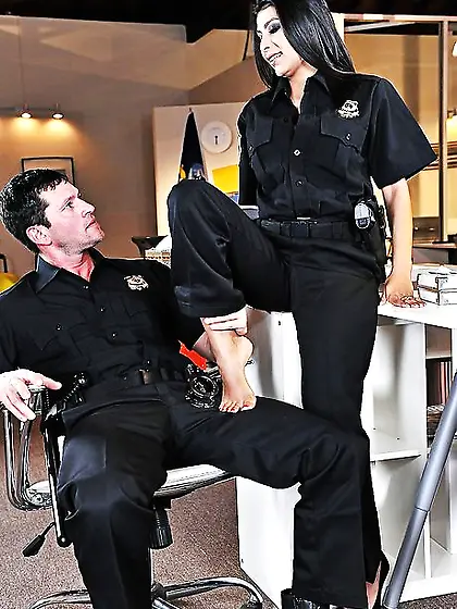 Lustful police officer makes partner lick her feet and fucks him