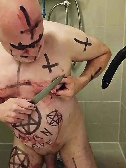 Satan Slave Cuts Open His Own Nipples