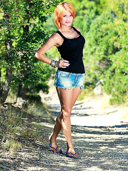 Cute redhead decides to walk and play in...